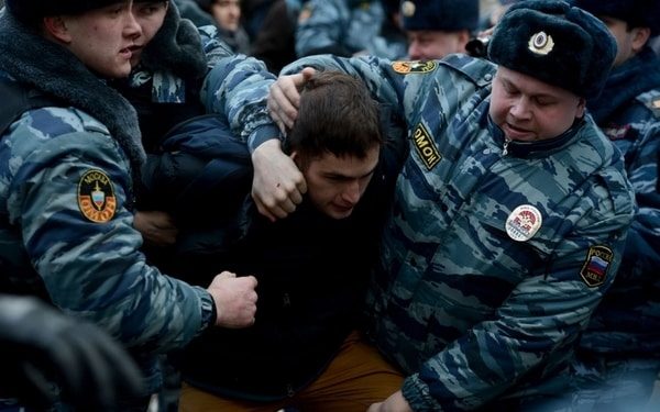 demonstration in Russia policemen-handle activists during a protest